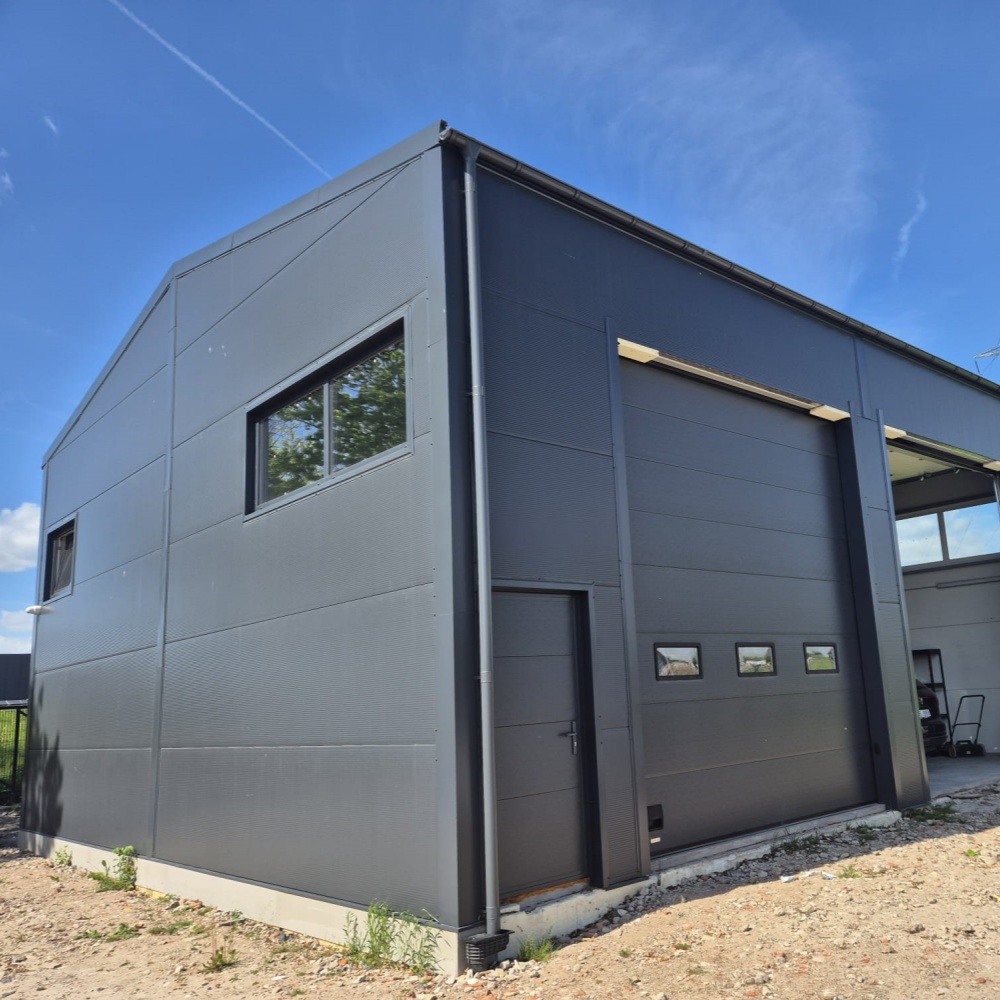 高品質の鉄骨構造建物倉庫ワークショップ建設用プレハブ鉄骨フレーム